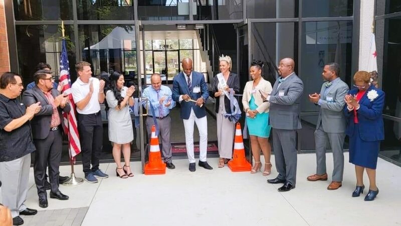 Grand Re-Opening ribbon cutting ceremony at Care Staffing Professionals with community leaders