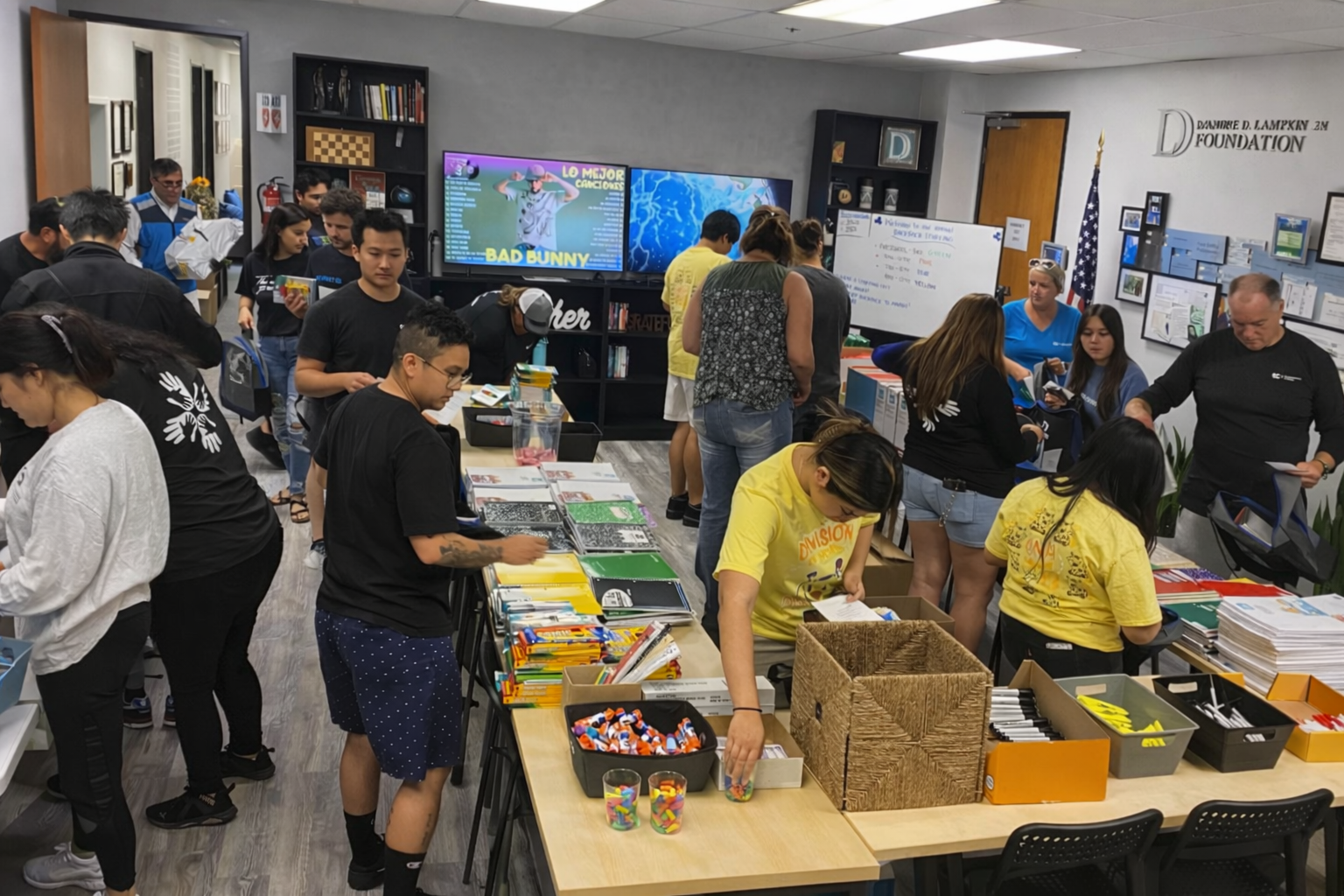 Community volunteers and emergency partners distributing disaster relief supplies