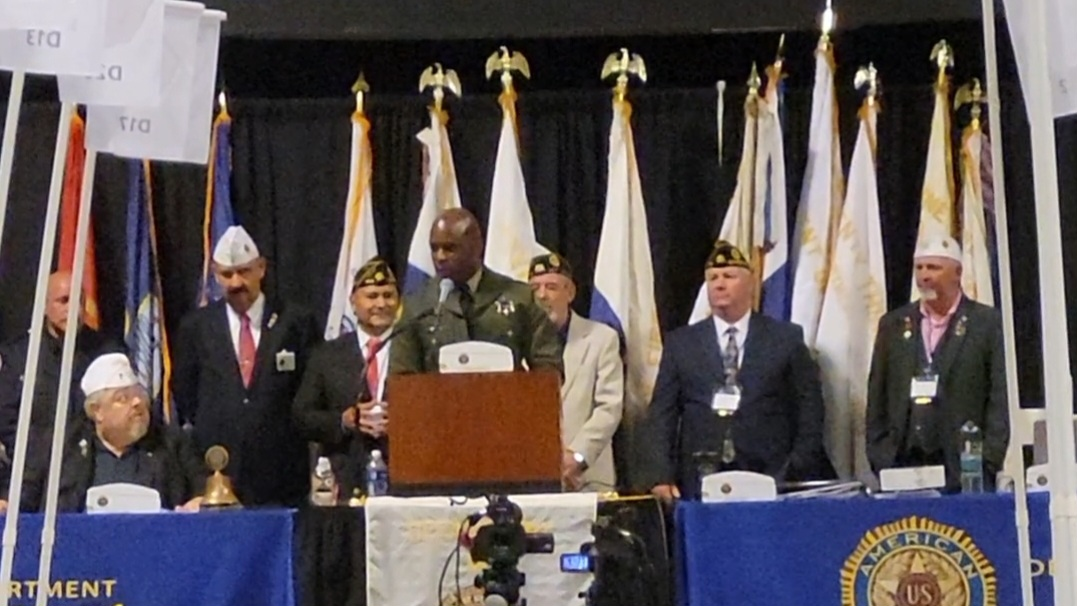 D'Andre Lampkin in Sheriff's uniform receiving the 2023 American Legion Law Enforcement Officer of the Year award